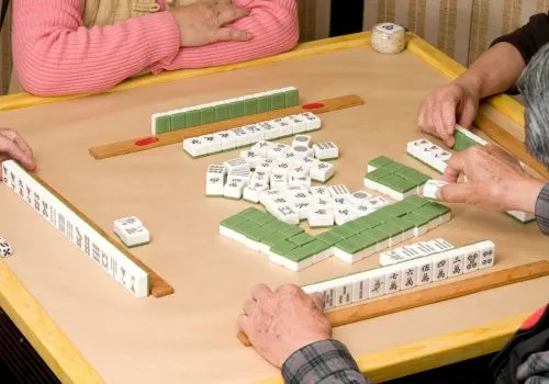 Playing a game of mahjong